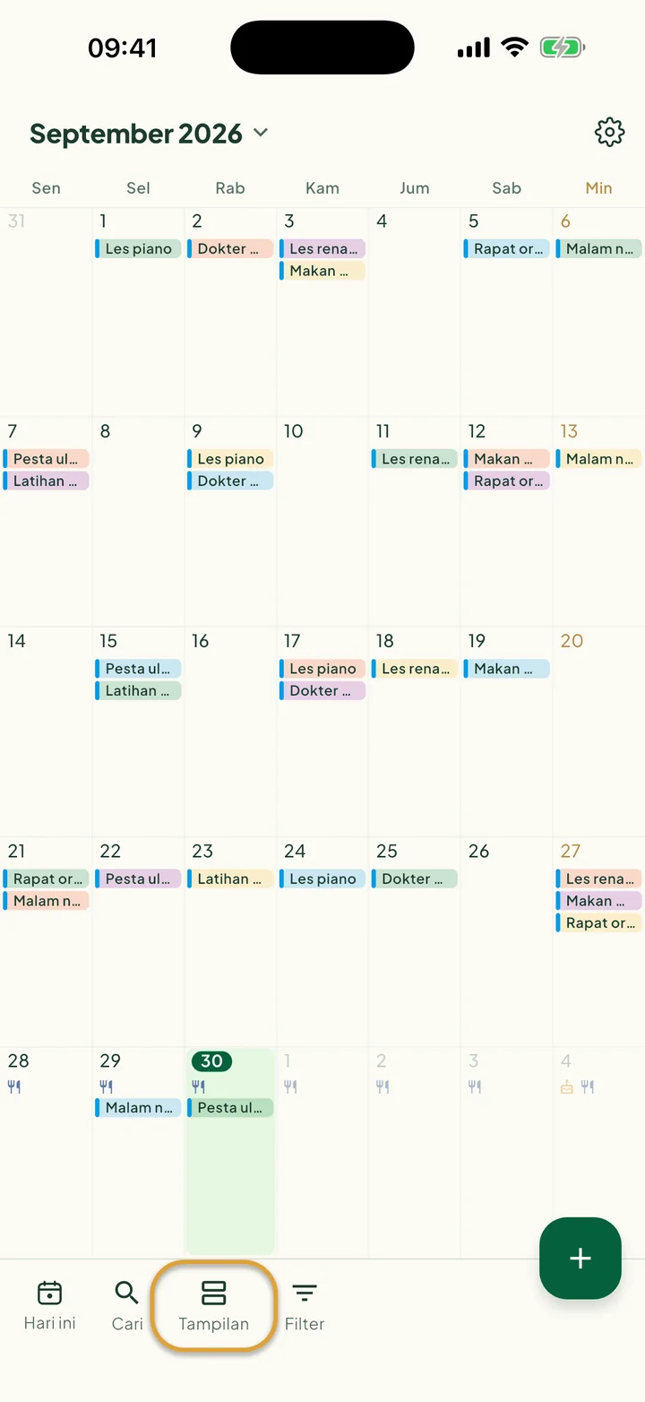 Kalender dalam tampilan Bulan. Tombol Tampilan di bilah bawah dilingkari.