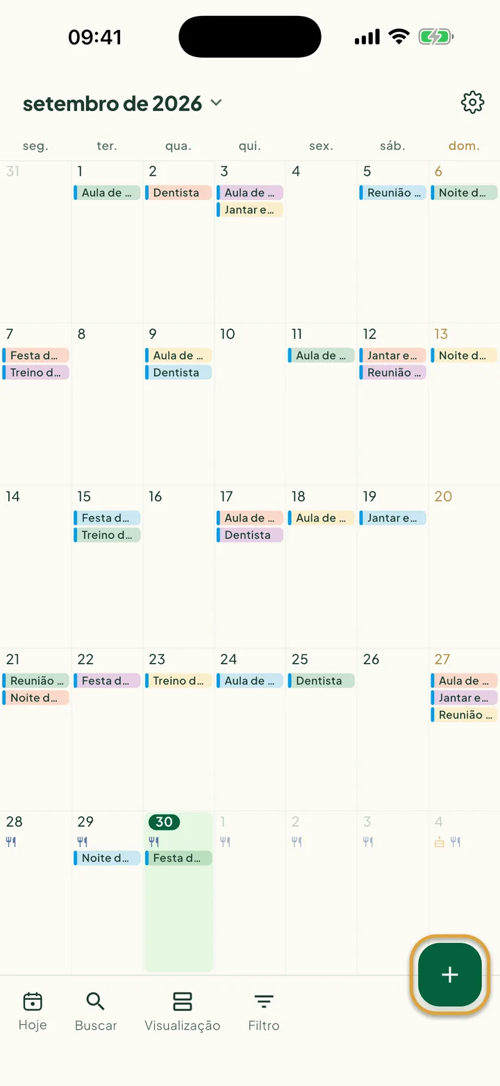 O calendário na visualização Mês. O botão + no canto inferior direito está circulado.